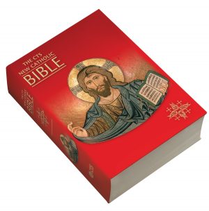 A paperback edition of The CTS New Catholic Bible, with a red cover and an image of Jesus holding an open Bible.
