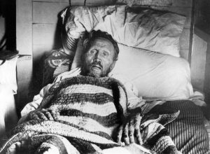 Father Damien on his deathbed